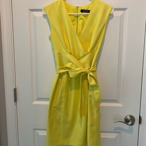 Bright yellow wrap dress